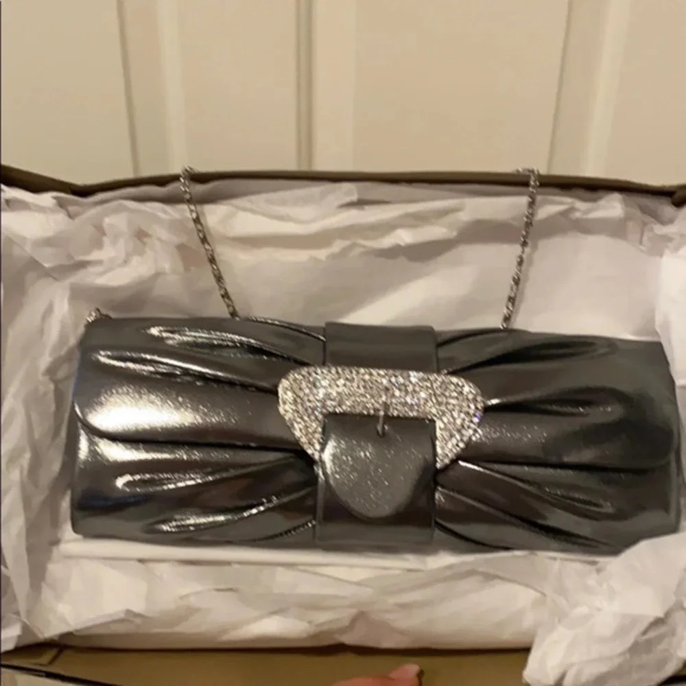 New Silver Shiny Clutch 11”X4” inches